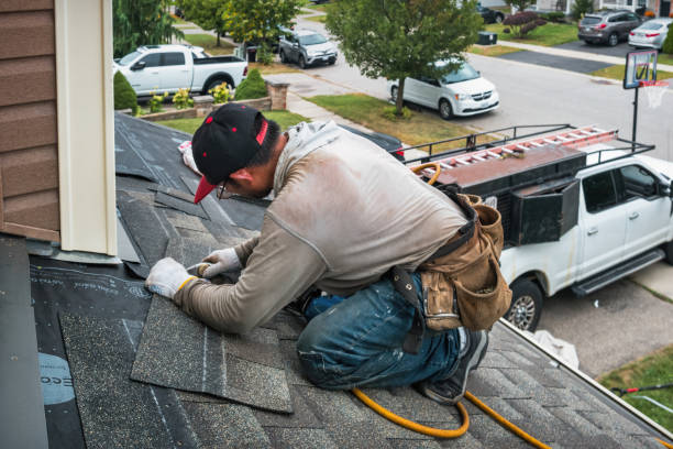 Professional Storm Damage Roof Repair technician working in Oak Brook, IL